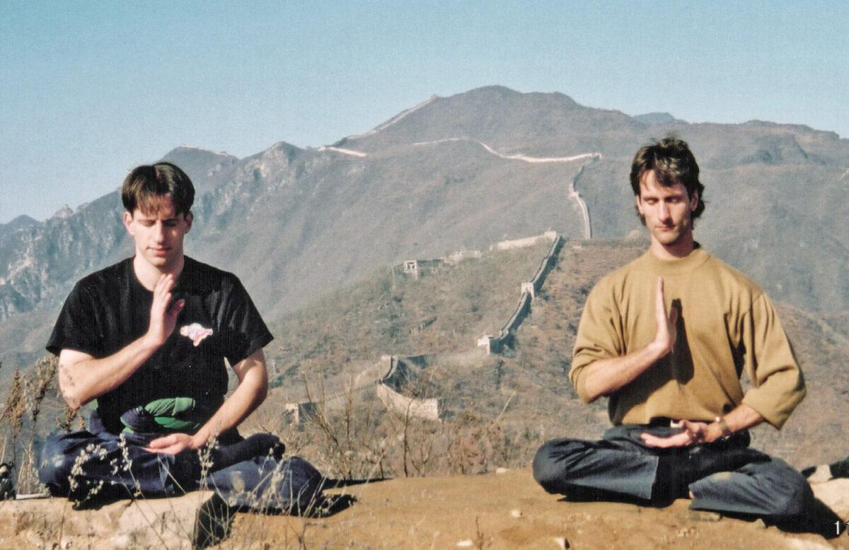 Zenon Dolnyckj and Joel Chipkar meditate on the Great Wall the day before their appeal in Tiananmen. (Courtesy of Joel Chipkar)