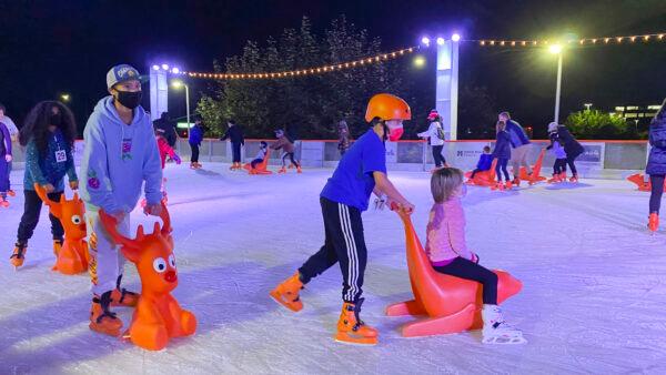 People ice skate at the opening ceremony at the Kristi Yamaguchi Holiday Ice Rink at City Center Bishop Ranch in San Ramon, Calif., on Nov. 17, 2021. (Ilene Eng/The Epoch Times)