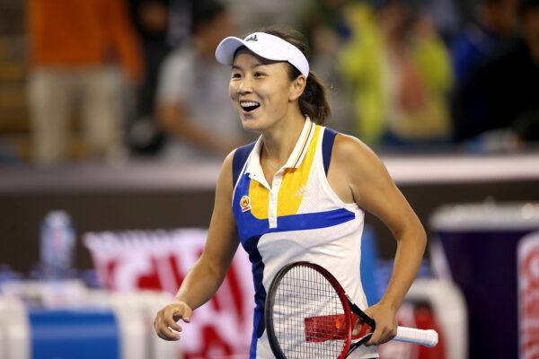 Peng Shuai of China celebrates after winning the Women's double quarterfinal match in Beijing on Oct. 6, 2017. (Emmanuel Wong/Getty Images)