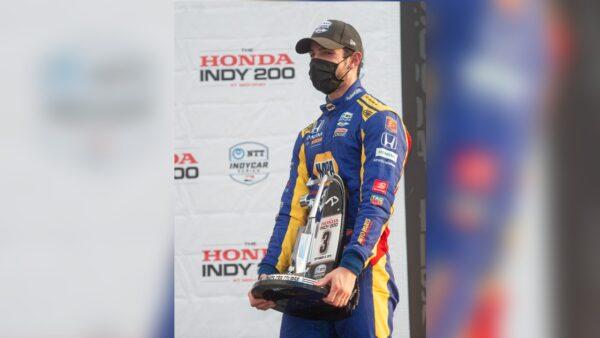 Third place finisher Alexander Rossi poses after the IndyCar Series auto race at Mid-Ohio Sports Car Course, in Lexington, Ohio, on Sept. 12, 2020. (Phil Long/AP Photo)