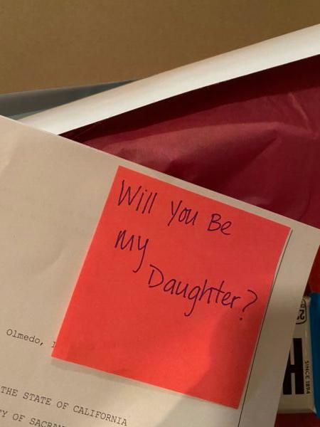 The heartwarming question along with the adoption papers. (Courtesy of <a href="https://www.instagram.com/izzymizzyy/">Isabel Arias</a>)