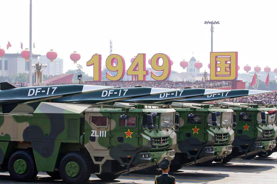 Military vehicles carrying hypersonic DF-17 missiles travel past Tiananmen Square during a military parade in Beijing, China, on Oct. 1, 2019. (Jason Lee/Reuters)