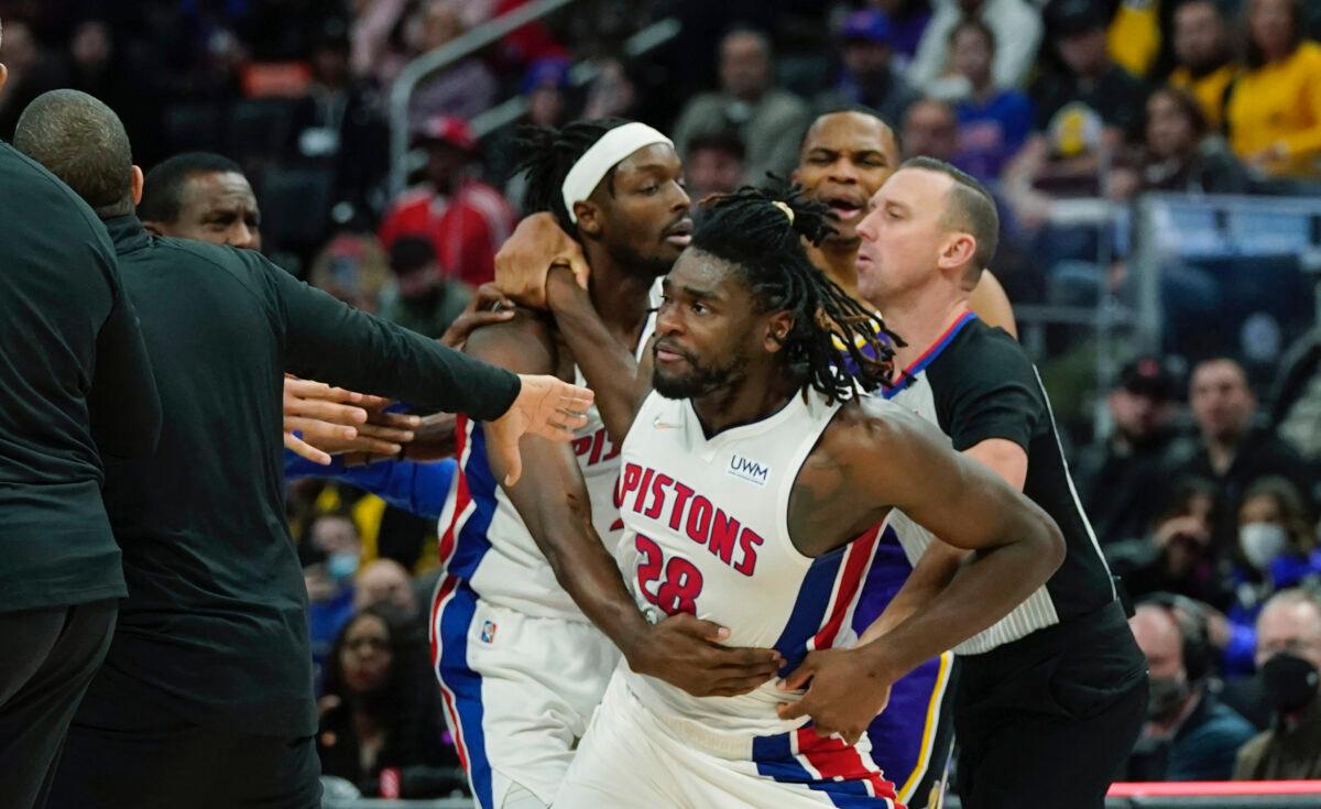 Detroit Pistons center Isaiah Stewart (28) is held back after a foul during the second half of an NBA basketball game against the Los Angeles Lakers in Detroit on Nov. 21, 2021. (AP Photo/Carlos Osorio)