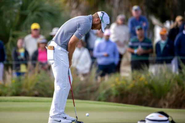 Talor Gooch reacts to a missed birdie putt on the first green during the final round of the RSM Classic golf tournament, in St. Simons Island, Ga, on Nov. 21, 2021. (Stephen B. Morton/AP Photo)