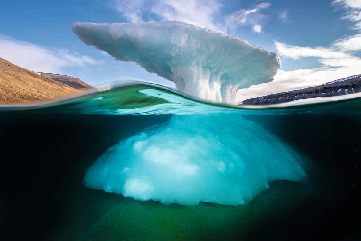 Grounded iceberg in Blanley Bay, Devon Island, Nunuvut, Canadian Arctic. (Courtesy of <a href="https://www.facebook.com/phaidoncom/">Phaidon</a>)