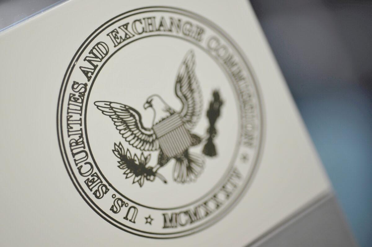 The U.S. Securities and Exchange Commission logo adorns an office door at the SEC headquarters in Washington on June 24, 2011. (Reuters/Jonathan Ernst)