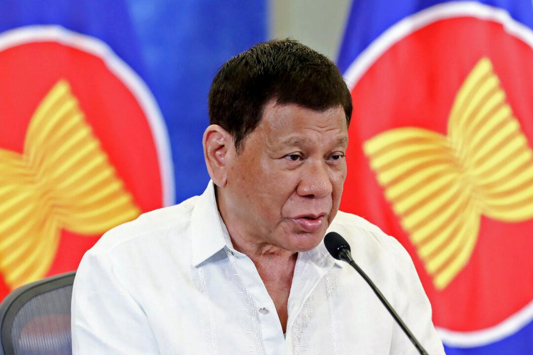Philippine Supply Boats Reach Forces at China-Guarded Shoal