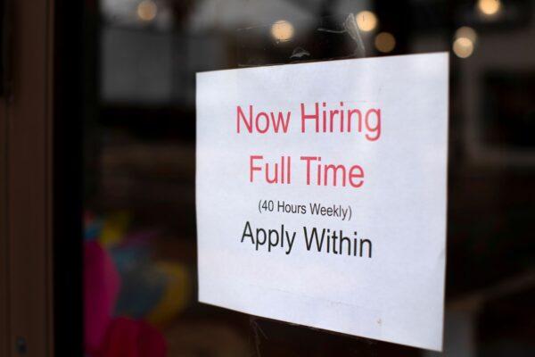 A retail store advertising a full-time job on its shop window in Oceanside, Calif., on May 10, 2021. (Mike Blake/Reuters)