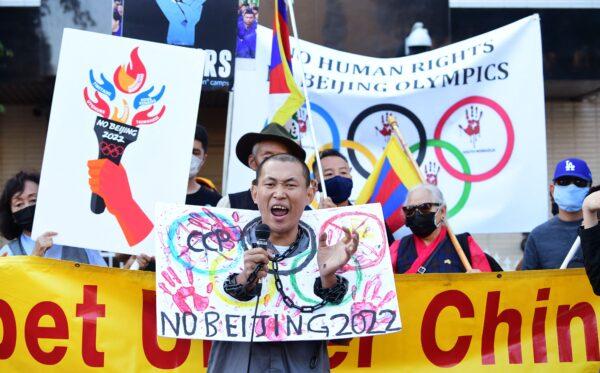 Activists rally in front of the Los Angeles Chinese Consulate in Los Angeles, calling for a boycott of the 2022 Beijing Winter Olympics due to concerns over China's human rights record in Los Angeles, Calif., on Nov. 3, 2021. (Frederic Brown/AFP via Getty Images)