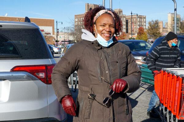 Ruth Shannon of Chicago says prices for Thanksgiving day dinner ingredients are up this year as she stands outside of the Local Market in Chicago on Nov. 23. (Cara Ding/The Epoch Times)