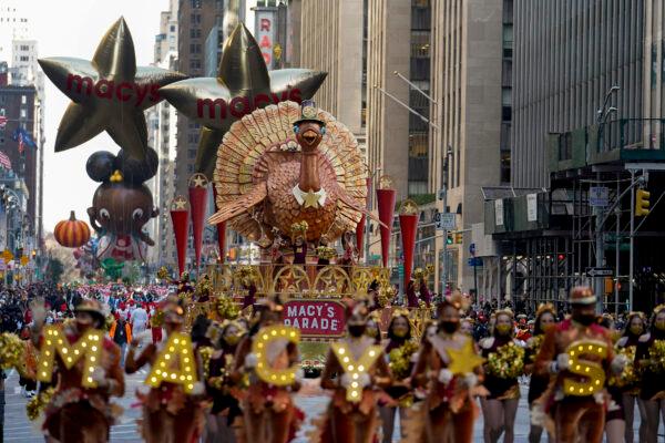The Tom Turkey float moves down Sixth Avenue during the Macy's Thanksgiving Day Parade in New York on Nov. 25, 2021. (Jeenah Moon/AP Photo)