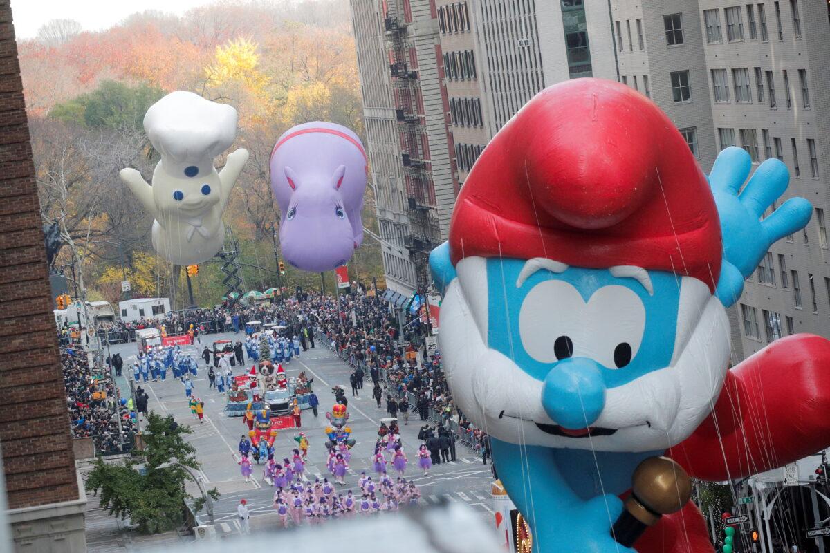 The Papa Smurf balloon flies during the 95th Macy's Thanksgiving Day Parade in Manhattan, New York City, on Nov. 25, 2021. (Brendan McDermid/Reuters)