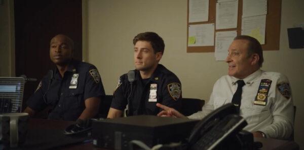 (L–R) Max Axel (Jermaine Well), Daniels (Ignacyo Matynia), and Frankie Romano (Cliff Lobrutto), sit for a talk in “A Good Cop.” (NTD Productions)