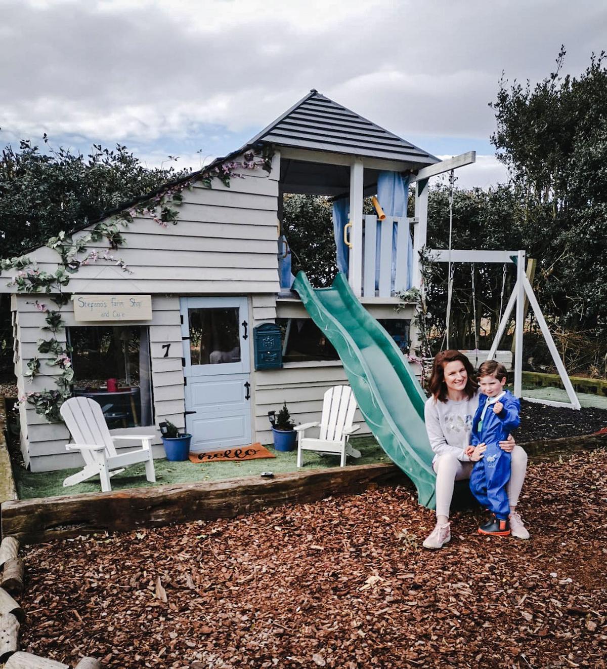 Gemma with her son Stefano outside the playhouse she built. (Courtesy of Caters News)