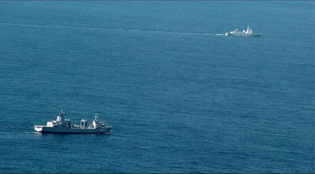 An Australian HMAS Navy ship (R) monitoring a Chinese spy ship (L) in August 2021. (Australian Defence Force)
