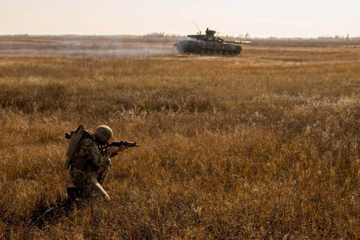 A serviceman of the Ukrainian Armed Forces takes part in military drills at a training ground near the border with Russian-annexed Crimea in Kherson region, on Nov. 17, 2021. (Press Service of General Staff of the Armed Forces of Ukraine/via Reuters)