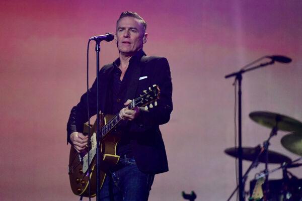 Singer-songwriter Bryan Adams performs during the closing ceremony of the Invictus Games 2017 at Air Canada Centre in Toronto on Sept. 30, 2017. (Harry How/Getty Images for the Invictus Games Foundation)