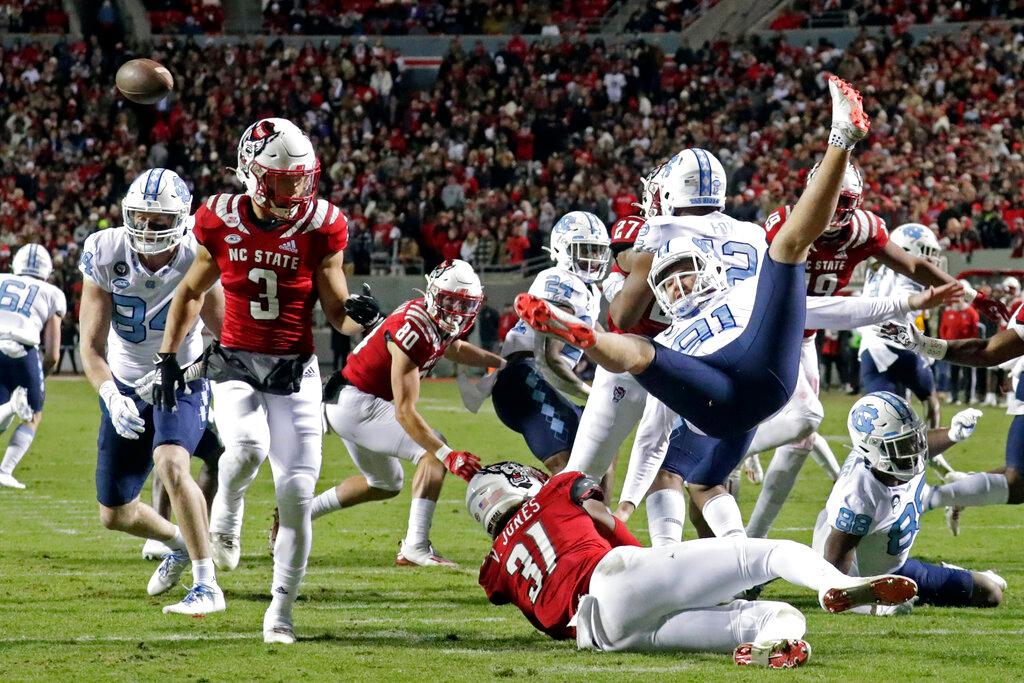 College Football Highlight: Wild Finish as Wolfpack Beat Tar Heels