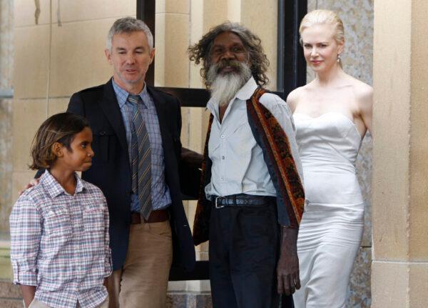 Australian Indigenous actor David Gulpilil, second right, film director Baz Luhrmann, second left, walks with actors Brandon Walters, left, and Nicole Kidman, right, following a press conference for their latest movie, Australia, in Sydney, on Nov. 18, 2008. (Mark Baker/AP Photo)