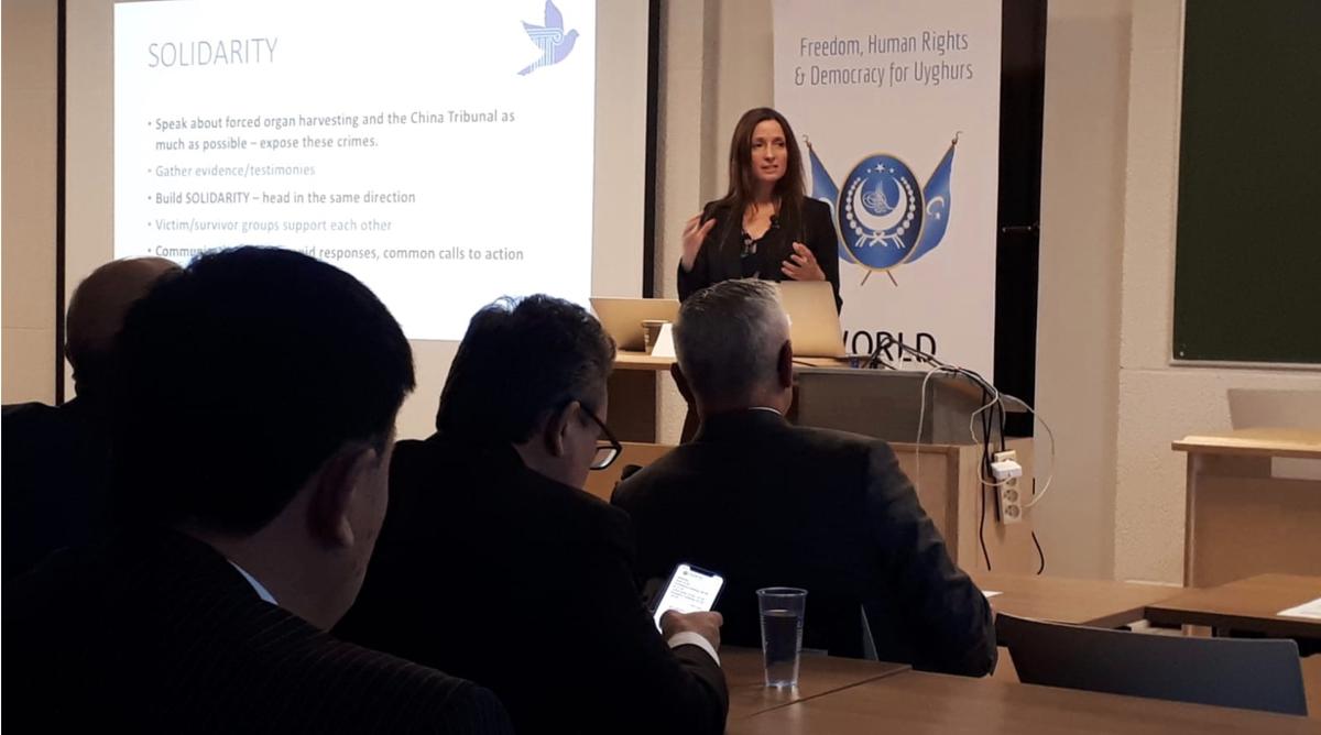 Susie Hughes, executive director of ETAC, speaks at the World Uyghur Congress Conference in Brussels in December 2019. (Courtesy of <a href="https://endtransplantabuse.org/">ETAC</a>)