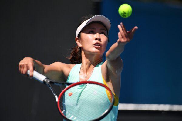 China's Peng Shuai serves the ball during a practice session ahead of the Australian Open tennis tournament in Melbourne on Jan. 13, 2019. (William West/AFP via Getty Images)