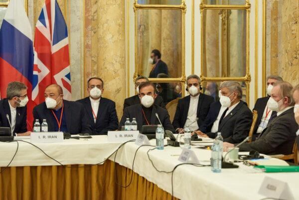 Iran's chief nuclear negotiator Ali Bagheri Kani and members of the Iranian delegation wait for the start of a meeting of the JCPOA Joint Commission in Vienna, Austria, on Nov. 29, 2021. (EU Delegation in Vienna/Handout via Reuters)