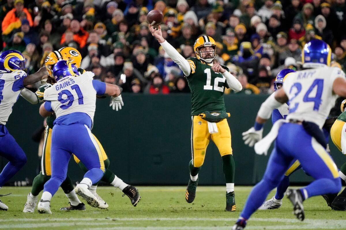 Green Bay Packers' Aaron Rodgers throws a pass during the first half of an NFL football game against the Los Angeles Rams in Green Bay, Wis., on Nov. 28, 2021. (Morry Gash/AP Photo)
