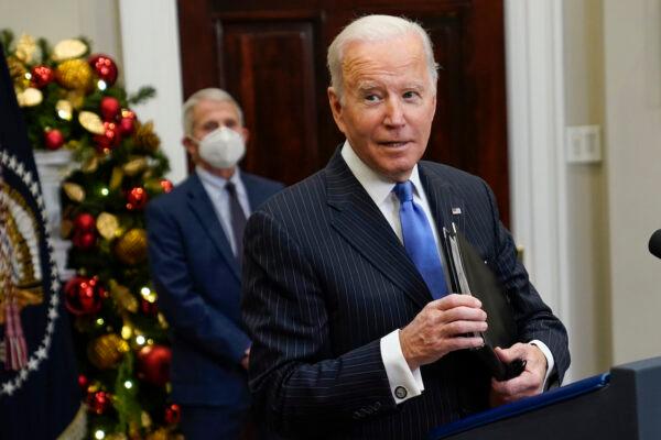 President Joe Biden answers a question as he speaks about the COVID-19 variant named omicron in the Roosevelt Room of the White House in Washington on Nov. 29, 2021. (AP Photo/Evan Vucci)