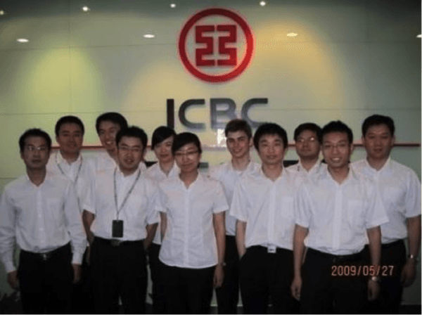 Adam Molon with ICBC employees during a 2009 visit to the bank's Suzhou Industrial Park office. (Courtesy of Adam Molon)