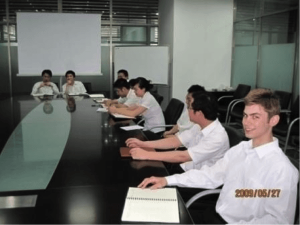 Adam Molon with ICBC employees in a boardroom at a Suzhou Industrial Park office of ICBC in 2009. (Courtesy of Adam Molon)