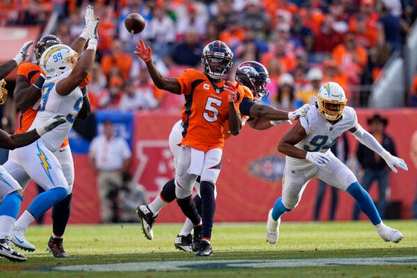 Denver Broncos quarterback Teddy Bridgewater (5) throws against the Los Angeles Chargers during the first half of an NFL football game, in Denver, on Nov. 28, 2021. (Jack Dempsey/AP Photo)