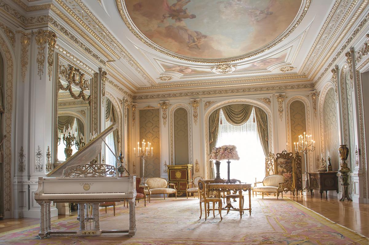 The Drawing Room is decorated in the Louis XVI style. The light tones and refined finishes create a harmonious atmosphere that was suitable for Henry Flagler's wife, Mary Lily, who would gather guests here for music and conversation. The painting on the piano lid is of Erato, the Muse of love poetry. (Flagler Museum)