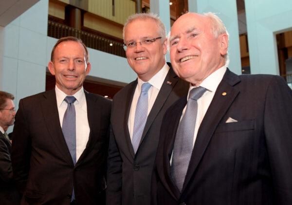 Prime Minister Scott Morrison (C) with former Prime Ministers Tony Abbott and John Howard (R) after leaving the Senate at Parliament House in Canberra, Australia, on July 2, 2019. (Tracey Nearmy/Getty Images)