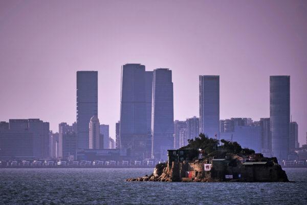 An island that lies inside Taiwan's territory is seen with the Chinese city of Xiamen in the background on Feb. 4, 2021. (An Rong Xu/Getty Images)