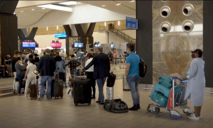 Frustration at South African Airport as Foreigners Try to Fly Home