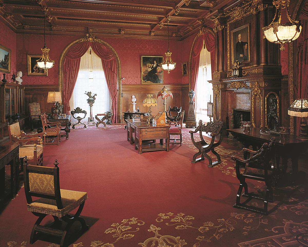 Designed in the style of the Italian Renaissance, the Library was a place for cultural enrichment. Portraits of great Americans such as George Washington line the walls to offer inspiration and to remind guests of the wisdom and virtues employed while forging America. Flagler received guests and business associates here. (Flagler Museum)