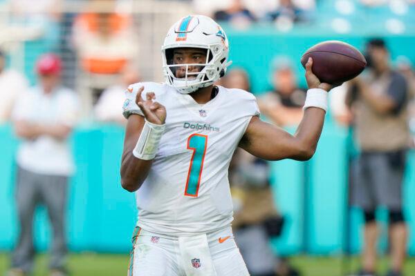 Miami Dolphins quarterback Tua Tagovailoa (1) aims a pass during the second half of an NFL football game against the Carolina Panthers, in Miami Gardens, Fla., on Nov. 28, 2021, (Wilfredo Lee/AP Photo)