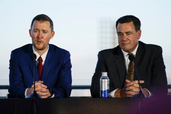 Lincoln Riley (L) the new head football coach of the University of Southern California, and Athletic Director Mike Bohn, answer questions during a ceremony in Los Angeles on Nov. 29, 2021. (Ashley Landis/AP Photo)