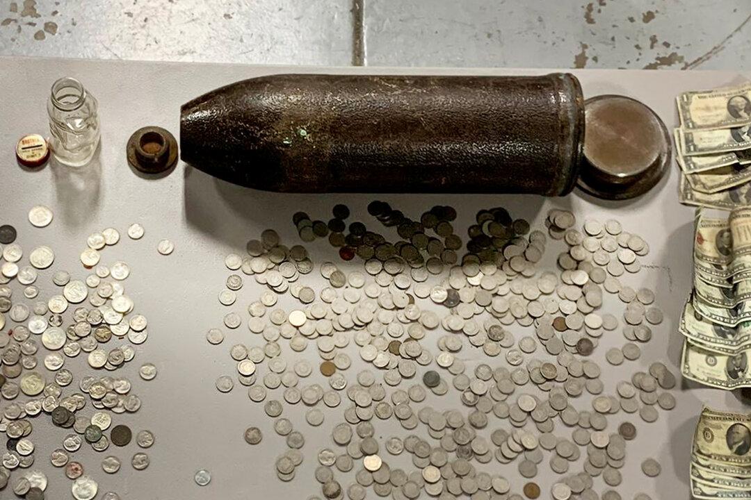 Michigan Family Find WWI-Era Artillery Shell Filled With Antique Coins While Cleaning House