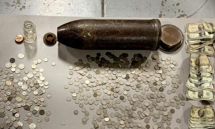 Michigan Family Find WWI-Era Artillery Shell Filled With Antique Coins While Cleaning House
