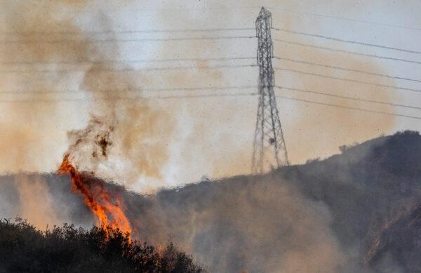 A wildfire burns in Silverado Canyon, Calif., on Dec. 3, 2020. (John Fredricks/The Epoch Times)