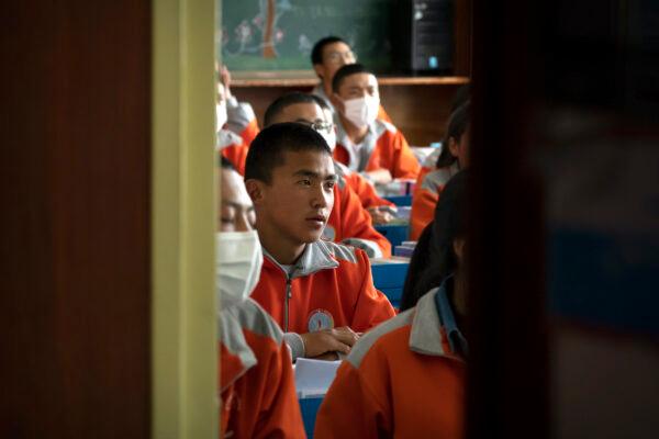 Students attend a class at Nagqu No. 2 Senior High School, a public boarding school in Lhasa, Tibet, on June 1, 2021. (Mark Schiefelbein/AP Photo)