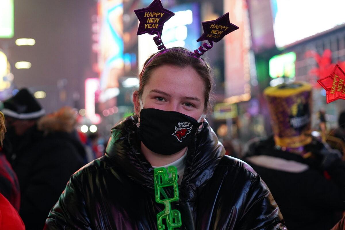 Victoria Christensen celebrates New Year's Eve 2022 at Times Square in New York on Dec. 31, 2021. (Enrico Trigoso/The Epoch Times)