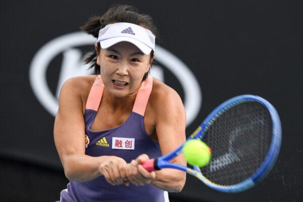 China's Peng Shuai hits a return against Japan's Nao Hibino during their women's singles match on day two of the Australian Open tennis tournament in Melbourne, Australia, on Jan. 21, 2020. (Greg Wood/AFP via Getty Images)