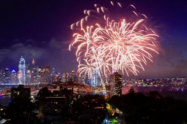 Fireworks light up the sky over Sydney Harbour during New Year's Eve celebration in Sydney, Australia, on Dec. 31, 2021. (Mark Evans/Getty Images)