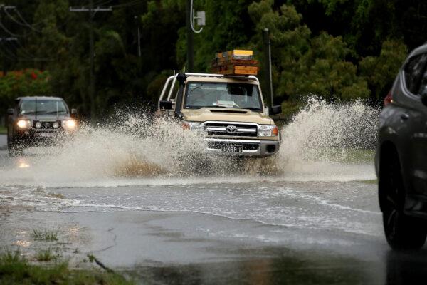 Local flooding west of Brisbane, Australia, on Dec. 1, 2021. (AAP Image/Jono Searle)