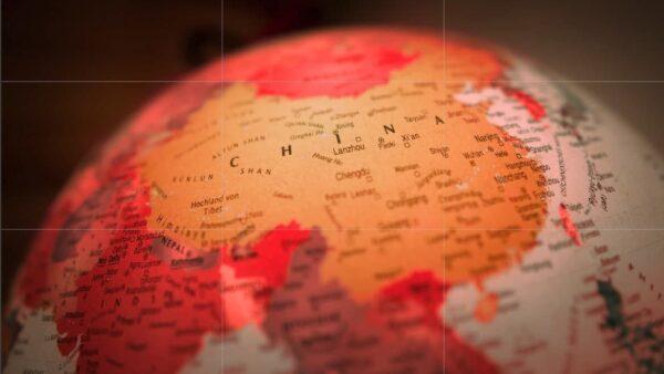 China and surrounding countries, on a globe. (Christian Lue/Unsplash)