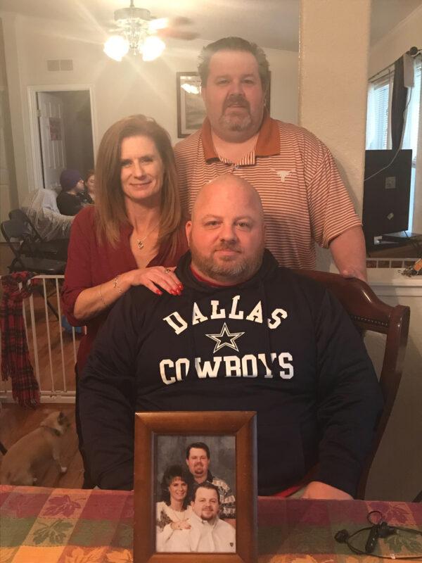 Tim (C) with his brother and sister at Thanksgiving 2019, six months before the stroke. (Courtesy of <a href="https://www.facebook.com/tim.k.wilkinson">Tim Wilkinson</a>)
