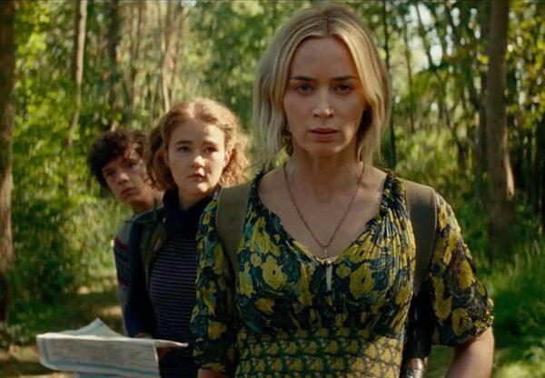 (L–R) Marcus (Noah Jupe), his sister Regan (Millicent Simmons), and their mother, Evelyn Abbott (Emily Blunt), must stay quiet to survive hostile aliens, in “A Quiet Place Part II.” (Paramount Pictures)