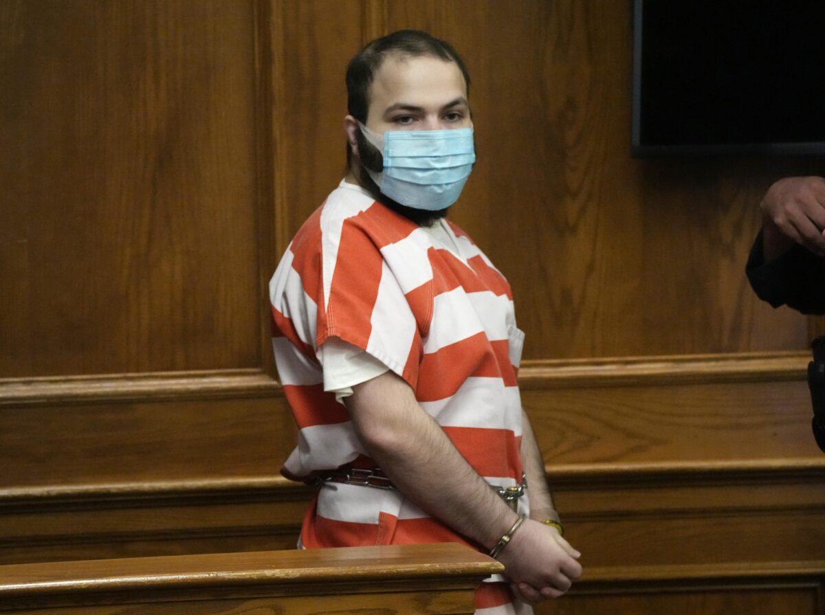 Ahmad Al Aliwi Alissa, accused of killing 10 people at a Colorado supermarket in March, is led into a courtroom in Boulder, Colo., on Sept. 7, 2021. (David Zalubowski/AP Photo)